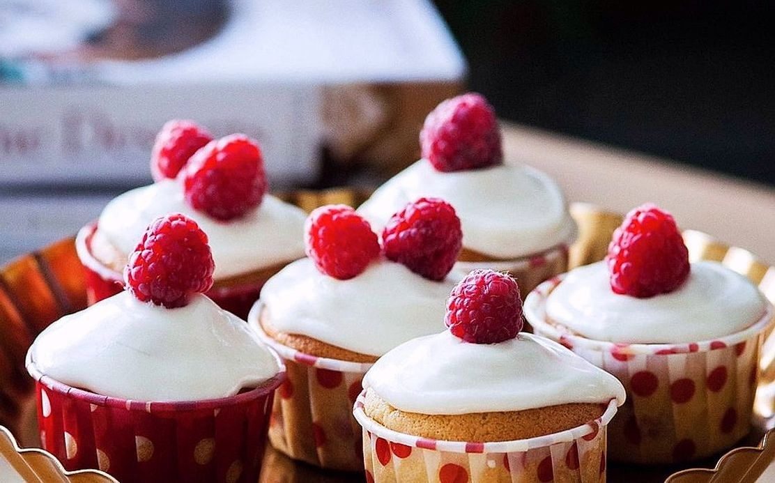 A slice of brown butter cake with frosting